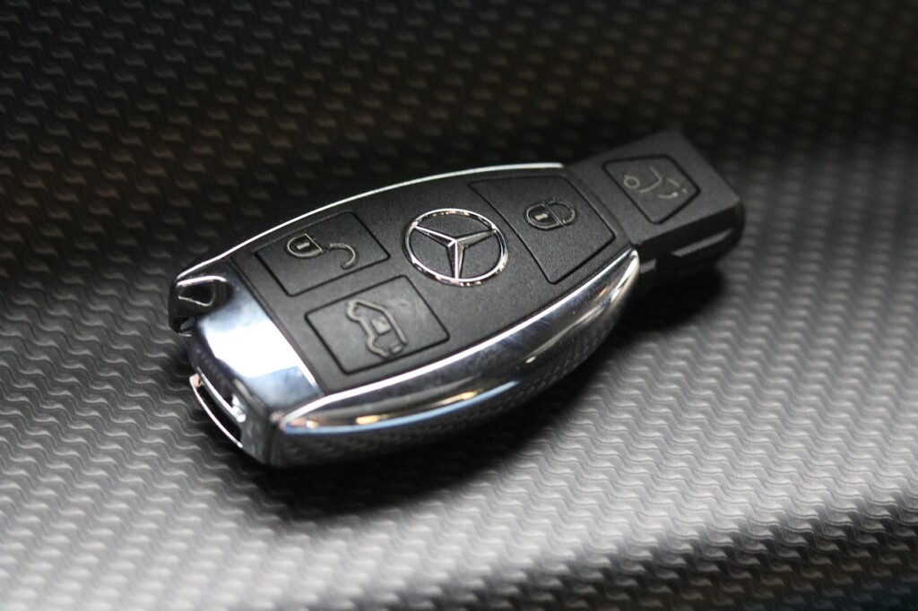 K&E Locksmith Pearland TX technician programming car key mercedes,