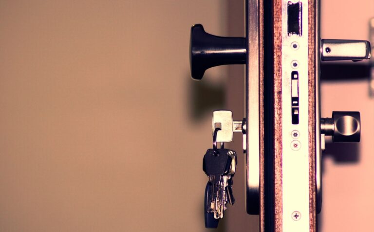 Professional locksmith at work representing locksmith costs in Houston TX