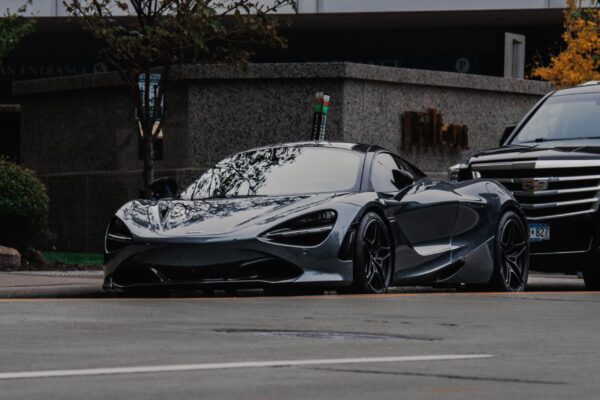 Black luxury sports car representing luxury car key programming in Houston TX
